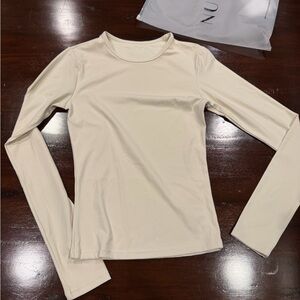 Elegant Cream Long Sleeve Top